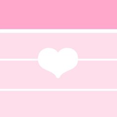 a pink and white wall with a heart in the middle on it's side