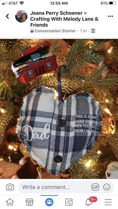 a heart ornament hanging from a christmas tree