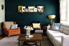 a living room with two couches and a coffee table in front of a window