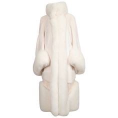 Very rare and dramatic off-white fur coat made of mink, fox and lamb fur from Alexander McQueen. Labeled an Italian size 42. Approximate measurements: shoulder 16", bust, waist and hip are open due to cape like design at back. Sleeves are very full. Hidden fur hooks at front. Quilted silk lining. Made in Italy. Excellent condition. Alexander Mcqueen 90s, White Fur Coat, Alexander Mcqueen Fashion, Fox Fur Jacket, Fur Jackets, Outfit Plan, Future Outfit, 2000s Fashion Outfits, Fox Fur Coat