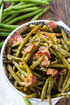 green beans with bacon in a blue and white bowl