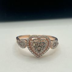 A Beautiful, Stunning 14k Strawberry Rose Gold Heart Shaped Ring With Chocolate And Vanilla Round Diamonds Approximately 1/2ctw Marked Levian, 14k, And Tested Using A Gold Metal Analyzer Machine Weighs 2.8 Grams Ring Size 6.75-7 *Note There Is One White Diamond Missing, But No Worries We Will Replace It For You! :)* *Does Not Come With Original Packaging! This Box Is Used For Staging Purposes Only! Thank You! :)* Luxury Rose Gold Diamond Ring For Valentine's Day, Luxury Heart Cut Diamond Ring For Valentine's Day, Valentine's Day Diamond Heart Cut Ring, Valentine's Day Heart Cut Diamond Ring, Valentine's Day Heart-shaped Diamond Ring, Heart Shaped Diamond Ring For Valentine's Day, Elegant Double Heart Diamond Ring For Valentine's Day, Luxury Rose Gold Heart Ring For Valentine's Day, Valentine's Day Rose Gold Fine Jewelry Heart Ring