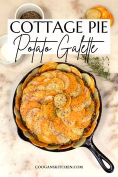 an image of cottage pie potato gratine in a cast iron skillet on a marble countertop