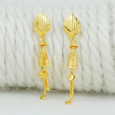 Celebrate the essence of Indian heritage with these radiant 22k gold earrings. Each earring is meticulously designed with traditional patterns that catch the light and add a regal touch to your look. Perfect for both festive occasions and elegant evenings, these earrings are a testament to the rich history of Indian jewelry, offering a blend of classic beauty and modern sophistication. 22k gold earrings handmade jewelry made in India Metal is Real Gold Not Filled or Not Gold Plated Metal - Yello 22k Gold Earrings With Latkans For Gift, 22k Gold Drop Earrings For Anniversary, Yellow Gold Earrings For Anniversary And Festivals, Festive Yellow Gold Earrings For Gift, Gold Latkans Earrings For Anniversary, Yellow Gold Drop Earrings Danglers For Gift, Yellow Gold Danglers Drop Earrings For Gift, Festive Gold Plug Earrings As Gift, Gold Hallmarked Drop Bridal Earrings