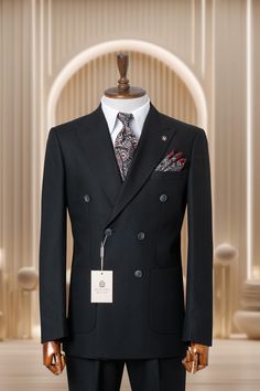 a mannequin wearing a suit and tie with a name tag on it's lapel