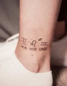 a woman's ankle tattoo with the zodiac sign and date on it, in black ink