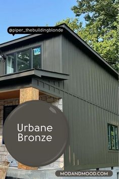 a house with the words urbane bronze in front of it and an image of a building