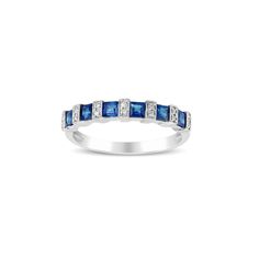 a white gold ring with blue sapphire and diamonds