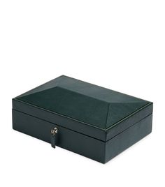 a black box with a green lid on a white background, it is open and closed