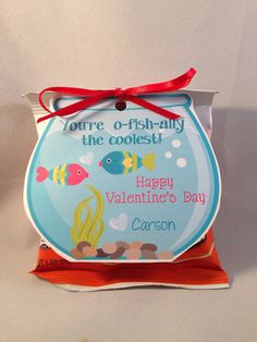 an ornament for valentine's day with fish on it