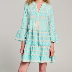 Handmade In Greece, This Brilliantly Embroidered Tunic Dress Radiates The Dreamiest Of Island Vibes - And Makes A Breezy Match For Go-To Sandals And A Tote. Cotton, Viscose Embroidered Detail 3/4 Sleeves V-Neck Tiered Tunic Silhouette Pullover Styling Machine Wash Greece Size: Xs 33.5" Long, Measured From Shoulder Seam To Hem. Underarm To Underarm: 18.5" Across. Shoulder Seam To Shoulder Seam: 16.5" Across Brand New With The Tag Attached Blue Embroidered Mini Dress, Blue Embroidered Tunic Dress For Spring, Blue Bohemian Embroidered Midi Dress, Neon Turquoise, Cotton Tunic Dress, Aztec Print Dress, Embroidered Tunic Dress, Cotton Tunic, Embroidered Tunic