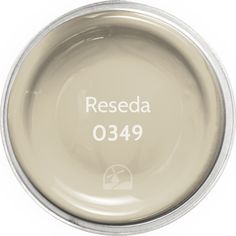 a white bowl with the words reseda on it's side and an empty container in the middle