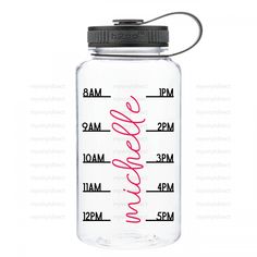 a clear water bottle with the words made in pink on it and a black lid