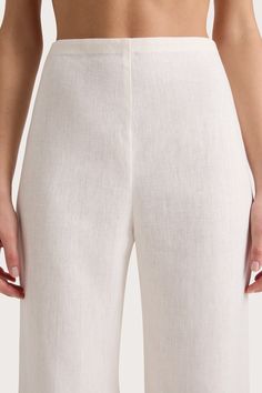 A classic high-rise pant that sits high at the waist. Designed from a signature 100% European Flax® linen fabrication in a creamy white, it has a smooth front that leads into a relaxed, straight leg. Style with the Emma Vest for elevated everyday wear or over swim for beach to bar wear. This style is true to size. Please note there is no elastic woven into the fabric so it does not offer any additional stretch. Maxi Dress Sale, Faithfull The Brand, High Rise Pants, Weekend Wear, High Waisted Trousers, Creamy White, Wrap Skirt, Playsuit Jumpsuit, Occasion Wear