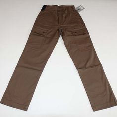 Duluth Trading Co Men's 40 Grit Standard Fit Cargo Pants Features 40 Grit Standard Fit Cargo Pants Flex Twill Flat Front Button Closure Zipper Fly Measured Waist/Inseam Of 28x30 Brand New $49.95 Msrp Price Brand: Duluth Trading Co Size: 28 X 30 Color: Brown Condition: New With Tags Fabric: 58% Cotton, 40% Polyester, 2% Spandex Measurements Waist: 14 (28 Inches Doubled) Hip: 19 (38 Inches Doubled) Front Rise: 10.5 Inches Back Rise: 13 Inches Inseam: 30 Inches Outseam: 39.5 Inches Leg Opening: 7.7 Utility Cargo Pants With Welt Pockets For Outdoor, Casual Outdoor Pants With Welt Pockets, Brown Outdoor Bottoms With Patch Pockets, Casual Hiking Bottoms With Patch Pockets, Fitted Brown Bottoms For Outdoor, Outdoor Utility Pants With Welt Pockets, Outdoor Straight Leg Chinos, Casual Brown Hiking Bottoms, Casual Brown Bottoms For Hiking