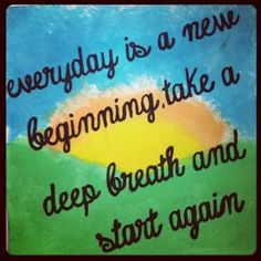 a painting that says, everyday is a new beginning take a deep breath and start again