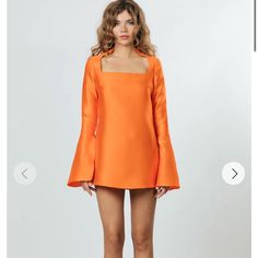 Featuring Long Sleeves, This Dress Comes In A Bold Orange Color For Strong Personalities. The Intricate Neckline Builds Up With A High Neck In The Back While Showing Enough Femininity In The Front. Fabric Supplier: Bombardo. Based In Barcelona, Bombard Is A Unique Textile House Offering Only The Most High-Quality Fabric. Textile House, Dresses Orange, Fabric Suppliers, Personalities, Home Textile, Orange Color, Quality Fabric, Colorful Dresses, High Neck