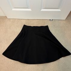 New Never Worn! Black Skirt. Super Cute. Size Small Black Stretch A-line Bottoms, Black Stretch A-line Mini Skirt, Black A-line Mini Skirt With Lining, Black A-line Skort With Lined Skirt, Black A-line Lined Skort, Casual Black Full Skirt, Casual Full Black Skirt, Black Flowy Full Mini Skirt, Casual Black Skort With Full Skirt