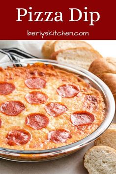 a pepperoni pizza sitting on top of a pan next to some slices of bread