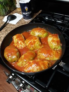 some food is cooking in a pan on the stove