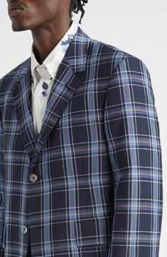 The label's emphasis on impeccable tailoring and premium materials shines through in the construction of a classic sport coat boldly patterned in plaid. Notched lapels Four-button cuffs Chest welt pocket; front flap pockets Back vent Partially lined 100% cotton Dry clean Made in Italy Designer Clothing Plaid Suit With Concealed Placket And Lapel Collar, Plaid Blazer With Concealed Placket And Lapel Collar, Plaid Blazer With Notch Lapel And Concealed Placket, Plaid Sport Coat With Lapel Collar And Hidden Buttons, Plaid Sport Coat With Welt Pockets, Plaid Sport Coat With Notch Lapel And Concealed Placket, Luxury Plaid Long Sleeve Sport Coat, Plaid Single Breasted Sport Coat For Semi-formal Occasions, Plaid Single-button Sport Coat For Semi-formal Occasions