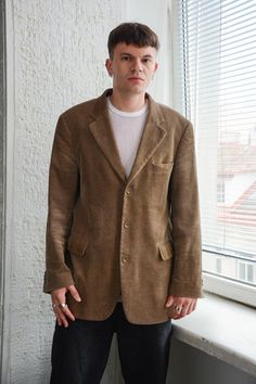 Vintage 80's brown corduroy blazer with pockets. UK size written XXL, BUT looks more like L-XL. Model size on the photo is M. Measurements: length 30 inches, sleeve 25 inches, chest 49 inches, waist 45 inches. Brown Corduroy Blazer With Long Sleeves, Brown Corduroy Long Sleeve Blazer, Casual Brown Corduroy Sport Coat, Winter Brown Corduroy Blazer, Brown Single-breasted Cotton Blazer, Brown Corduroy Blazer For Work, Brown Corduroy Single Breasted Blazer, Brown Corduroy Blazer With Pockets, Brown Single-breasted Corduroy Sport Coat