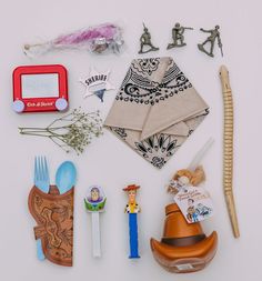 an assortment of items are laid out on a white surface