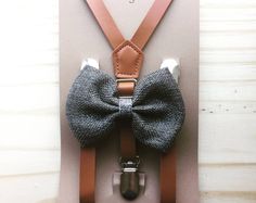 Caramel Leather Suspenders & Grey Burlap Bow Tie. The perfect set for weddings, groomsmen, ring bearer, and family photos Wedding Suspenders Groomsmen, Tan Bow Tie, Suspenders Groomsmen, Wedding Suspenders, Groomsmen Suspenders, Brown Suspenders, Tie Ring, Grey Bow Tie, Suspenders For Kids