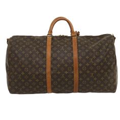 Brand: Louis Vuitton Model: Keepall Bandouliere 60 Colour: Brown Material: Canvas Included: Name Tag / Powanie / Shoulder Strap Dimensions: W60cm x H30cm x D26cm Serial number: VI871 Country of origin: France Condition: Good Outside:The corners of the bag are slightly rubbed and the handles are slightly . Inside:There are some small spots Travel Brand, Louis Vuitton Keepall, Louis Vuitton Brown, Hermes Bags, Brown Canvas, Vuitton Bag, Eco Conscious, Name Tag, Chain Bags