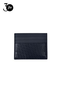 Polish��your everyday style with this card case from Fendi. Crafted from dark navy calf leather, it features the FF logo print embossed on the front and back. There are three card slots��on each side of the card case separated by one bill slot in the center. The slim profile and sleek design make for a sophisticated everyday essential.    Model: 7M0164��  Dark Navy Calf Leather  Embossed FF Print  Six Credit Card Slots  One Center Bill Slot  Measurements: 4" x 0.2" x 3.2" (LWH)  Includes Authent Ff Logo, Leather Card Case, Navy Leather, Everyday Style, Dark Navy, Card Case, Logo Print, Calf Leather, Slots