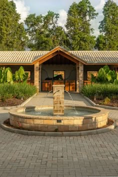 a fountain in the middle of a courtyard