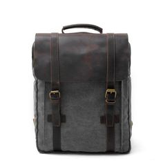 This bag for men is handcrafted with genuine canvas leather in a combination of black and pastel colors. Keep your stuff organized with this trendy bag from Innovato Design. It has a zipper closure type and soft handle design, making it easy to carry and wear. It is perfect for men and guaranteed can carry a 14-inch laptop together with your other gadgets and devices. It also has an exterior flap pocket for things that need easy accessibility.  Product Highlights:   Perfect match with your casual outfits  Highly affordable premium quality bag  Simple, convenient and durable  With an adjustable shoulder strap  With zipper and hasp closure types  Bag dimension: 42cm x 31cm x 11cm Cotton Backpack, Waxed Canvas Backpack, Travel Rucksack, Fish In A Bag, Laptop Rucksack, Commuter Bag, Canvas Messenger Bag, Naha, Vintage Canvas