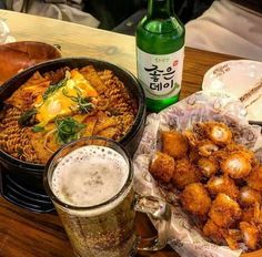 some food and drinks on a wooden table