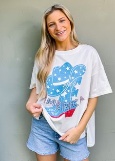 Step up your summer style in this playful Western boots graphic tee with 'America' sequin lettering embroidery. Perfect for Fourth of July festivities or just adding some fun and classic flair to your wardrobe. True to size Oversized fit intended Round neckline Pull on fit Sequin lettering embroidery Not lined 100% cotton Fabric has little stretch Lettering Embroidery, Tent Sale, Floral Dress Casual, Black Short Dress, Dressy Casual, Dress With Cardigan, Floral Dress Black, Casual Blouse, Headband Hairstyles