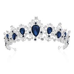 a tiara with blue and white stones on the front, set against a white background