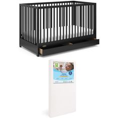 a baby crib next to a white mattress