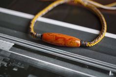 Nanhong Agate Long Charm: 27.2mm*8.5mm, adjustable from 7'' to 11'' Nanhong Agate Barrel Charm: 14.5mm*17.5mm, adjustable from 6.5'' to 11'' Colorful rope bracelet without charm: adjustable from 6'' to 9''  If you prefer smaller or larger size, please message me about custom sizing Nanhong Agate Clarity: opaque, unique color and high quality  We look forward to the opportunity of serving you！ Adjustable Orange Agate Bracelets, Adjustable Orange Agate Bracelet, Nanhong Agate, Adjustable Cord Bracelet, Cord Bracelet, Cord Bracelets, Bracelet Gold, Charm Bracelets, Unique Colors