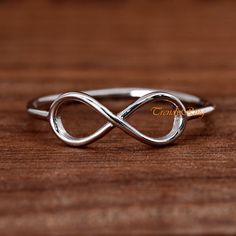 Minimalist Sterling Silver Infinity Ring, Infinity Symbol Promise Ring ▷Gift Box Included ▷5mm Height ▷Size 3 - 13 Available ▷925 Sterling Silver (not plated or filled) ▷925 Stamp Authenticity https://www.etsy.com/shop/TrendyRing Ring Gift Box, Silver Infinity Ring, Promise Ring Gift, Infinity Ring, Thumb Ring, Infinity Symbol, Thumb Rings, Girlfriend Gift, Gift For Girlfriend