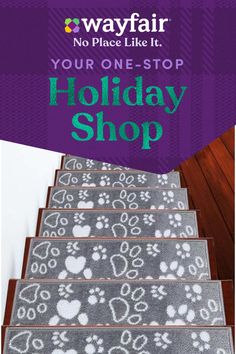 a set of carpeted steps with the words holiday shop written on them and paw prints