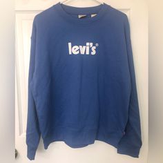 Blue Colored Levi’s Crewneck Sweater. Large White Levi’s Logo Across Chest. Nice Thick Sleeves Cuffs And Bottom Band. Size Large In Men’s (Can Be Unisex). Made Of 60% Cotton, 40% Polyester. New With Tags. Feel Free To Ask Questions Or Make Me An Offer!! Levi's Blue Crew Neck Tops, White Levis, S Logo, Sweaters Crewneck, Levis Men, Crewneck Sweater, Large White, Crew Neck Sweater, Levi's