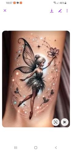 a tattoo design with a fairy on the side of her leg, and butterflies flying around it