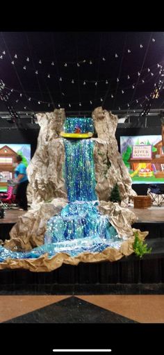 an indoor waterfall is displayed on the floor