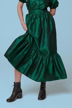 Elegant Green Skirted Bottoms, Green Voluminous Pleated Skirt, Green Ruffled Maxi Skirt For Party, Green Ruffled Tiered Skirt Bottoms, Green Ruffled Tiered Skirt, Green Ruffled Skirt For Fall, Green Lined Maxi Skirt For Fall, Green Tiered Skirt For Party, Green Full Skirt For Party