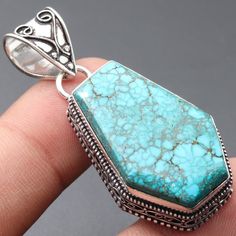 Coffin Turquoise Gemstone Pendant Necklace Pendant Gemstone Vintage Style Pendant Gift For Her Sterling Silver Plated Jewellery Gift For Him Materials Sterling Silver Plated Pendant Size 2.1 x 1 Stone Name Coffin Turquoise Color- Sky Blue Shipping Policy We do ship through DHL, UPS, INDIA POST. I make the gemstones myself for my valued customers so I assure you that the gemstones are Natural and are made from ethically sourced roughs. The rest of the pendant is made from 925 Sterling silver Plat Turquoise Stone Jewelry As A Gift, Turquoise Stones Jewelry Gift, Turquoise Pendant Necklace As Gift, Turquoise Jewelry With Stones For Gifts, Turquoise Jewelry With Stones As A Gift, Bohemian Turquoise Rectangular Jewelry, Turquoise Jewelry With Large Stone As Gift, Turquoise Jewelry With Large Stone For Gift, Turquoise Gemstone Rectangular Pendant Jewelry