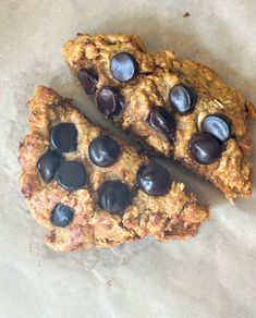 two pieces of cookie with chocolate chips on top