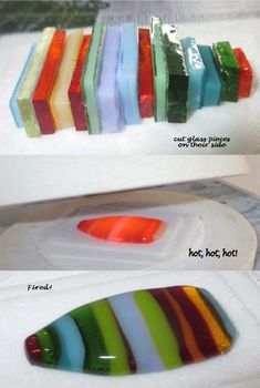 four different colored glass pieces sitting on top of a white plate with writing underneath them