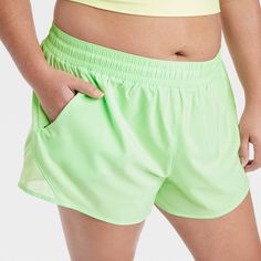 Why we're ALL IN: Mid-rise shorts designed in a solid hue to take you through anything from training sessions and walks to intense runs in effortless comfort. Tailored in regular-fit, these mid-rise shorts are designed from a moisture-wicking fabric with a quick-dry finish to help keep you cool and dry. A full elastic waistband provides a secure fit, while a side zippered pocket finishes off the sporty look. All in Motion™: Made for every move, priced for every day. Green Athletic Shorts With Built-in Shorts, Solid Athletic Shorts With Go-dry For Training, Solid Color Sportswear Athletic Shorts For Running, Running Athletic Nylon Shorts - Solid Color, Green Athletic Shorts For Summer Running, Solid Go-dry Sports Shorts, Solid Color Athletic Shorts For Running, Solid Sports Shorts With Go-dry Technology, Breathable Athletic Shorts For Running