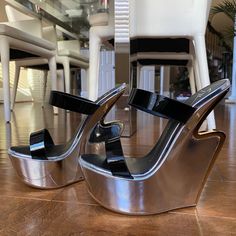 The Front Row Set Is Addicted To Giuseppe Zanotti's Spotlight-Stealing Wedges With A Nearly Heelless Illusion & This Artfully Modern Cutout Pair Trimmed With A Lightning Bolt Of Molten Metal Is An Especially High-Impact Pair. Approx 6” Wedge Heel With Golden Logo Cutout Approx 1.75” Platform; Approx 4.25” Heel Equiv. They Are In New, Excellent, Unworn Condition With Mild Scuff On Platform Area. Comes With Box,Dust Bag & Card. Runs At Least A Size Small... Insole Length Measurement Provided For G Nude Stiletto Heels, Aesthetic Dump, Molten Metal, Red Studs, Golden Logo, High Heel Mules, Heels Outfits, Length Measurement, Heel Mules