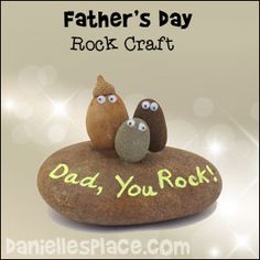 a rock with two rocks on it that says, father's day rock craft dad you rock