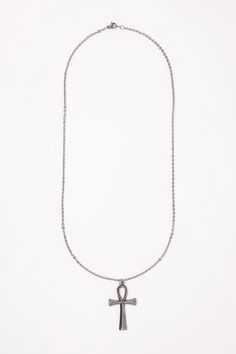 This Stainless Steel Chain Necklace with Ankh Pendant is the perfect blend of style and ancient symbolism. The Ankh pendant, an ancient Egyptian symbol of life, adds a touch of spirituality and cultural significance to this necklace. Whether you're looking to make a fashion statement or simply want to add a meaningful accessory to your collection, this necklace is a great choice. Plus, with its affordable price and versatile design, it makes a great gift for any friend or loved one. Size Length: Symbolic Metal Chain Necklace, Spiritual Metal Pendant Chain Necklace, Spiritual Pendant Metal Chain Necklace, Spiritual Silver Medallion Necklace With Adjustable Chain, Spiritual Pendant Chain Necklace, Symbolic Medallion Pendant Necklace, Spiritual Long Metal Necklace, Amulet Style Medallion Necklace With Lobster Clasp, Amulet Style Long Necklace With Adjustable Chain